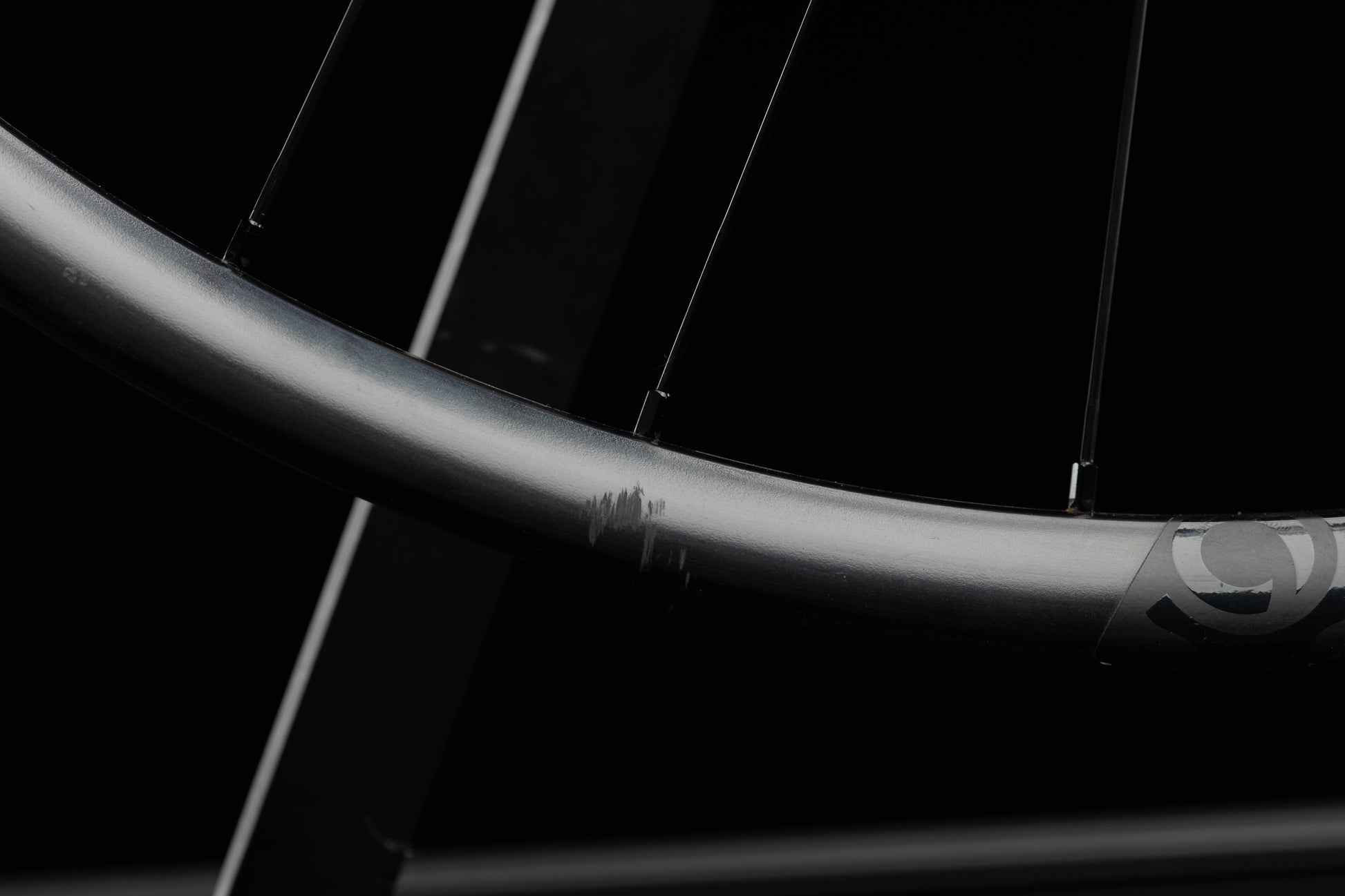 Close-up of a bicycle rim with a blurred background